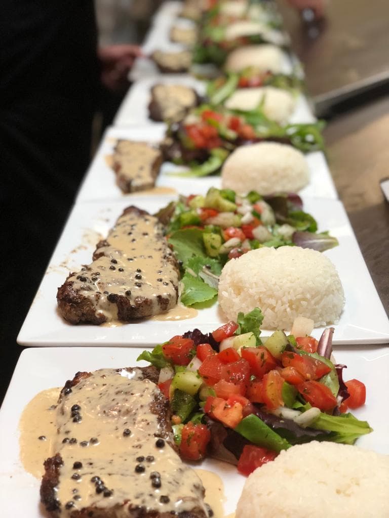 Bodrum Restaurant accepting the Herald-Tribune Readers' Choice, First Place award